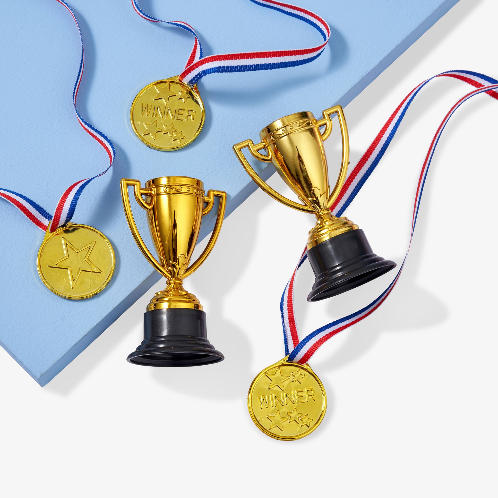 24 Plastic Trophies & Medals